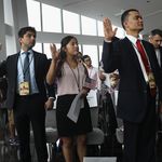 Immigrants take the oath of allegiance to the United States at a naturalization ceremony held in the observatory of the One World Trade Center <br>